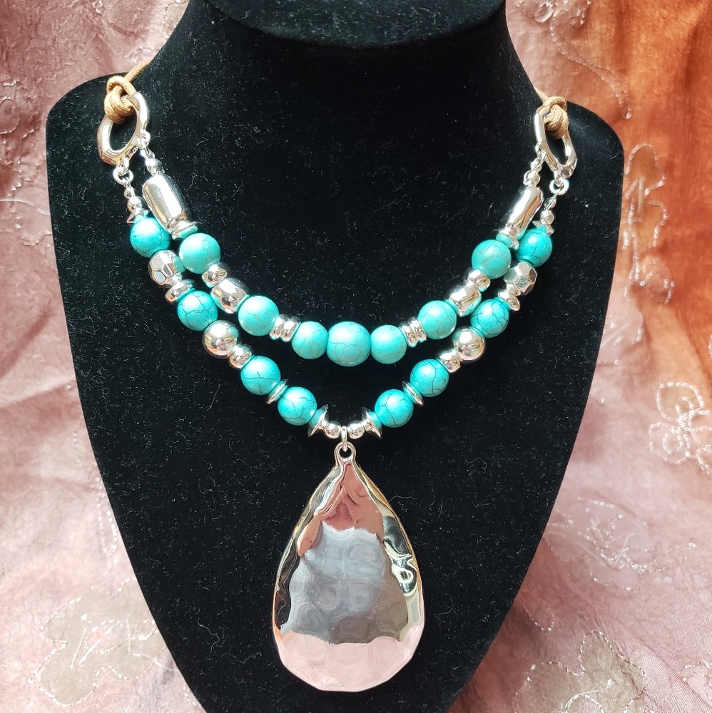Faux turquoise and silver southwest necklace.